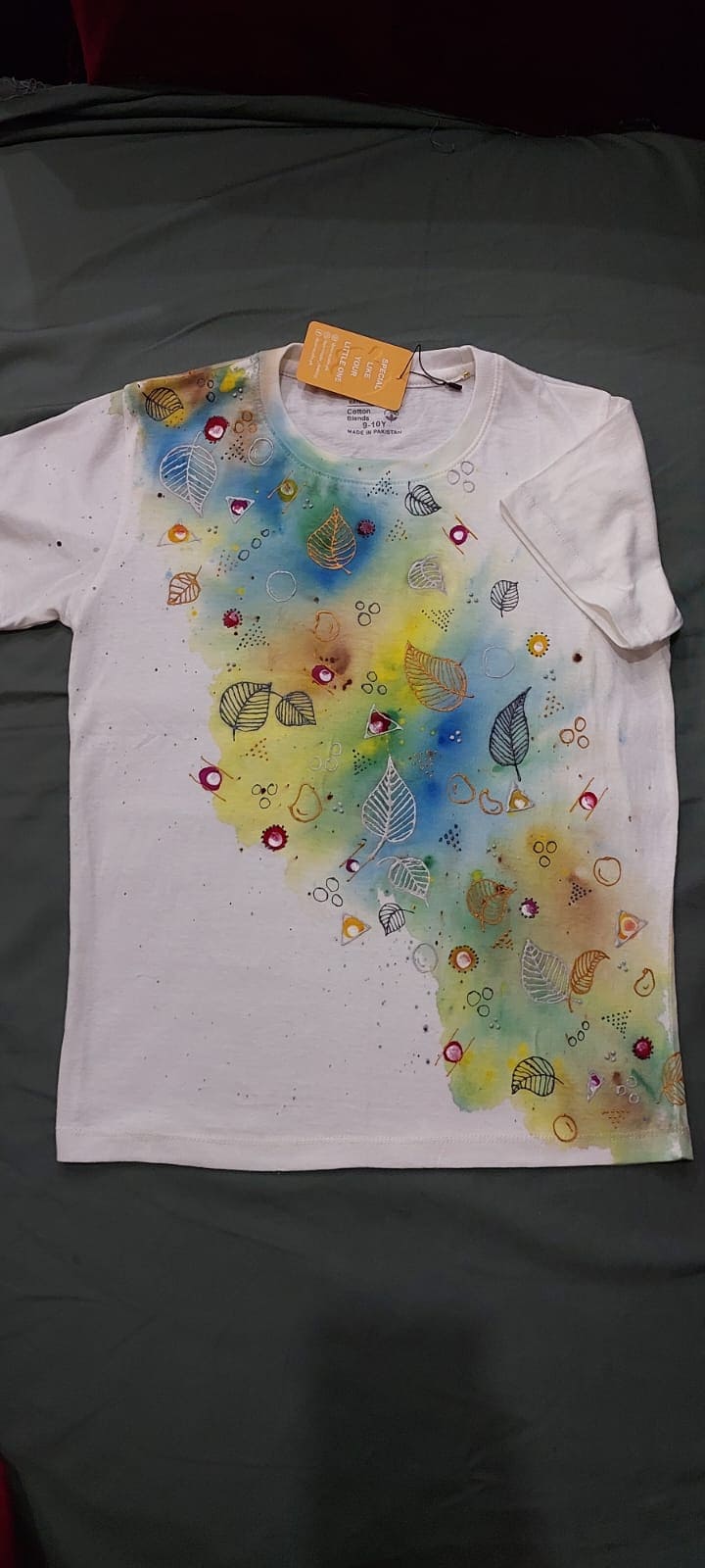 Hand painted design with tie and dye texture shirt